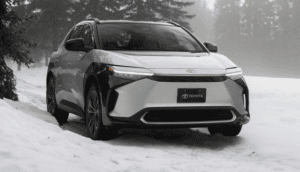 silver electric Toyota vehicle in snow